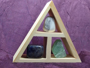This wooden handcrafted triangle is made of fir and holds three stones and crystals intuitively selected to help you in your intentions for increasing peace and calm in your life. 